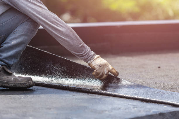 Professional Emergency Waterproofing technician working in Delmont, PA
